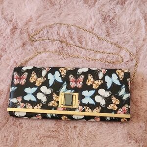 Elegant Butterfly Print Clutch with Gold Accents